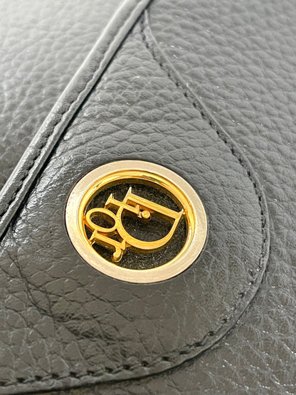 Christian Dior logo clasp gold hardware vintage Dior leather flap bag detail 1990s Dior bag